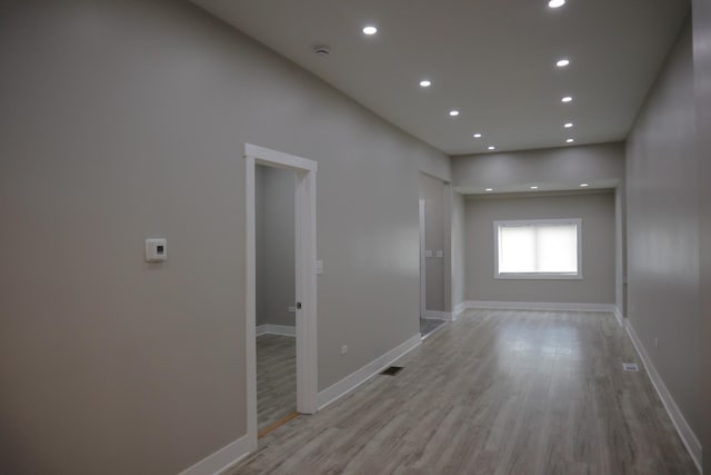 8346 S Baltimore Ave, Chicago, IL 60617 - unfurnished room with light wood-type flooring and recessed lighting