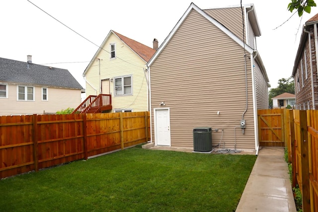 8346 S Baltimore Ave, Chicago, IL 60617 - rear view of house with a fenced backyard