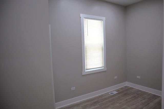 8346 S Baltimore Ave, Chicago, IL 60617 - spare room featuring wood finished floors and baseboards