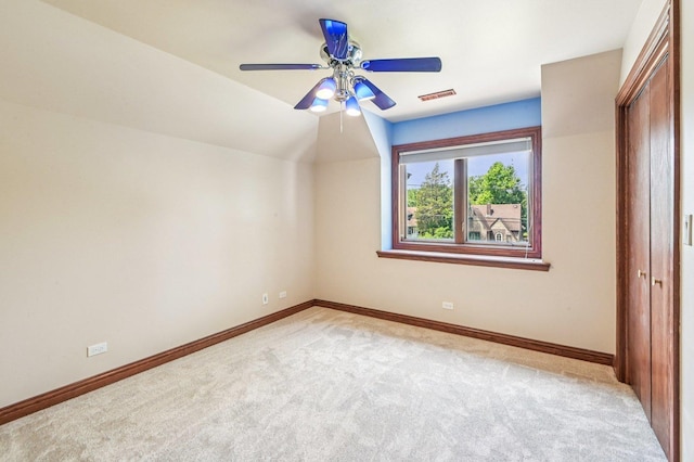 18229 Riegel Rd, Homewood, IL 60430 - unfurnished bedroom with light carpet and a ceiling fan