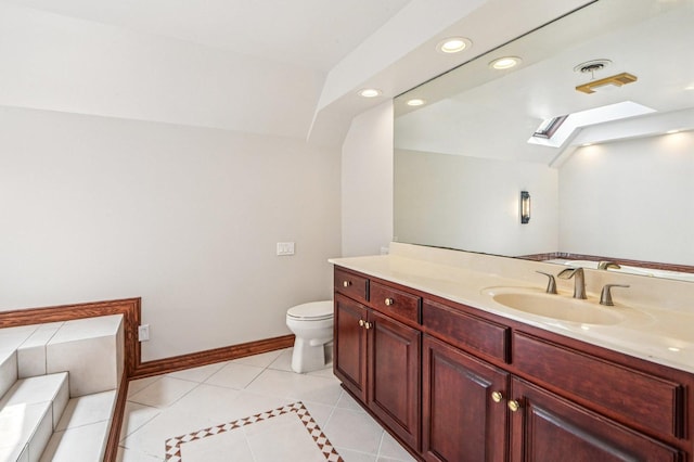 18229 Riegel Rd, Homewood, IL 60430 - bathroom with a skylight, vanity, recessed lighting, and tile patterned floors
