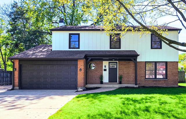 4532 Waubansie Ln, Lisle, IL 60532 - view of front facade with driveway, a chimney, brick siding, and a garage