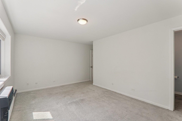 4711 Saint Joseph Creek Rd Unit 1E, Lisle, IL 60532 - carpeted spare room featuring baseboards