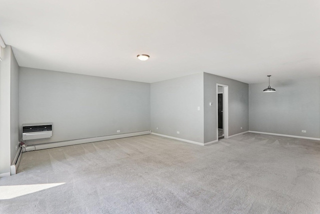4711 Saint Joseph Creek Rd Unit 1E, Lisle, IL 60532 - spare room featuring carpet floors and a wall mounted air conditioner