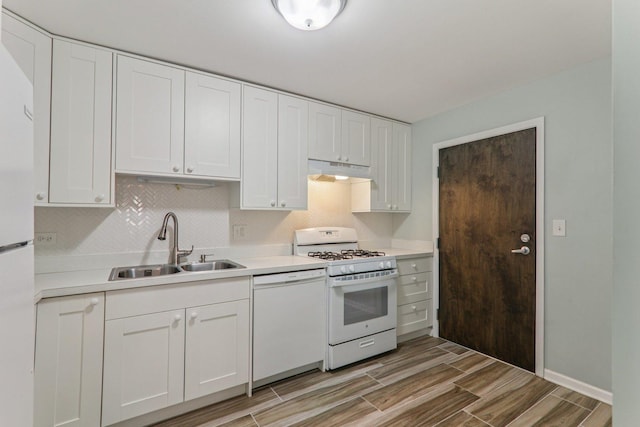4711 Saint Joseph Creek Rd Unit 1E, Lisle, IL 60532 - kitchen featuring white appliances, under cabinet range hood, light wood finished floors, white cabinets, and light countertops