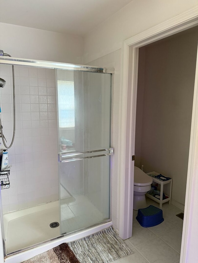 352 Bay Dr, Itasca, IL 60143 - full bath featuring a shower stall and tile patterned floors