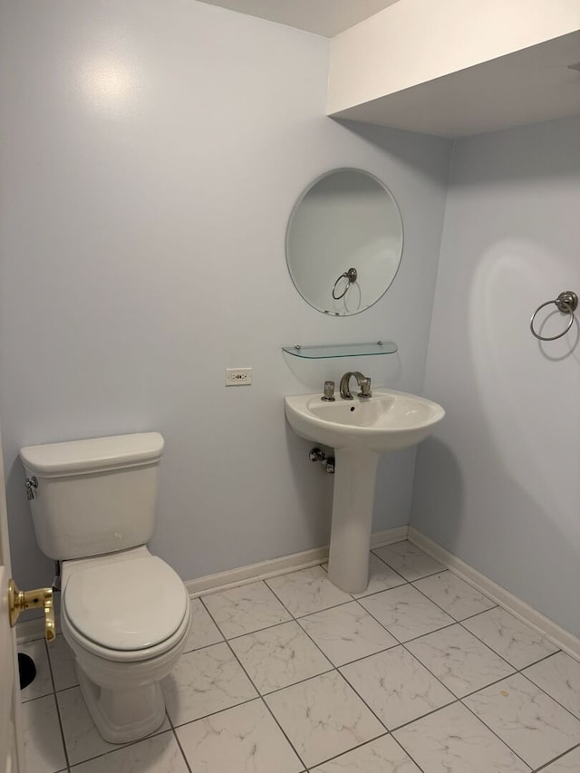 352 Bay Dr, Itasca, IL 60143 - bathroom with marble look tiles and toilet