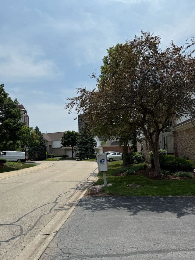 352 Bay Dr, Itasca, IL 60143 - view of asphalt road featuring curbs