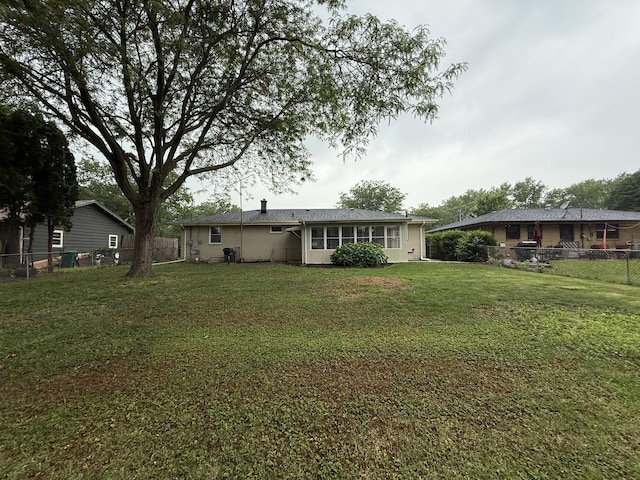 656 Springfield Ave, Joliet, IL 60435 - back of property with a fenced backyard