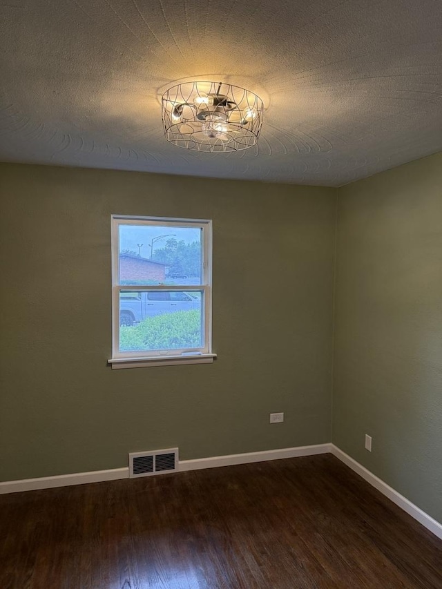 656 Springfield Ave, Joliet, IL 60435 - unfurnished room with wood finished floors and baseboards