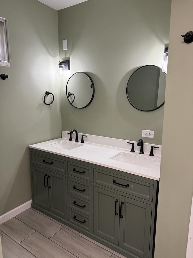 656 Springfield Ave, Joliet, IL 60435 - full bathroom featuring double vanity and wood finished floors