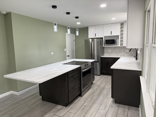 656 Springfield Ave, Joliet, IL 60435 - kitchen featuring stainless steel appliances, white cabinets, dark cabinets, wood finish floors, and recessed lighting