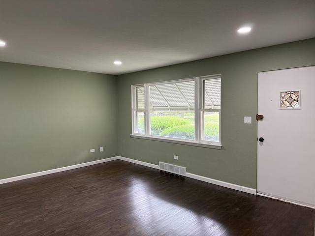 656 Springfield Ave, Joliet, IL 60435 - empty room with dark wood-style floors and recessed lighting