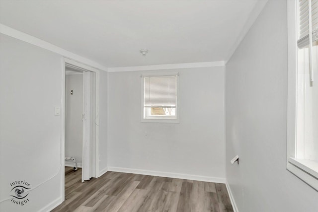 5716 W 64th Pl, Chicago, IL 60638 - empty room featuring wood finished floors and crown molding