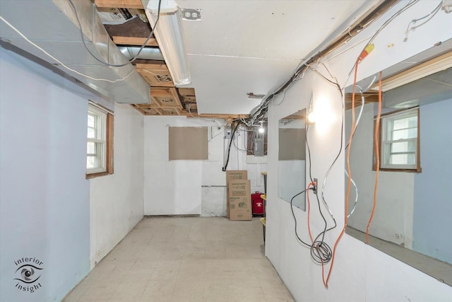 5716 W 64th Pl, Chicago, IL 60638 - basement featuring plenty of natural light, electric panel, and tile patterned floors
