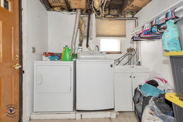 5716 W 64th Pl, Chicago, IL 60638 - laundry area with washing machine and clothes dryer and cabinet space
