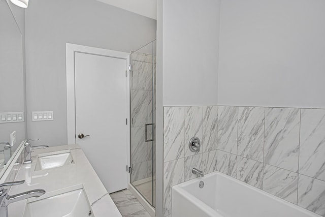 7239 S Exchange Ave, Chicago, IL 60649 - full bathroom featuring marble look tile flooring, a garden tub, a shower stall, and double vanity