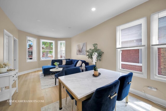5029 W Superior St, Chicago, IL 60644 - dining space featuring light wood-style flooring and recessed lighting