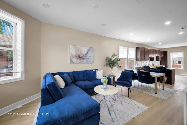 5029 W Superior St, Chicago, IL 60644 - living room with plenty of natural light, light wood-type flooring, and recessed lighting
