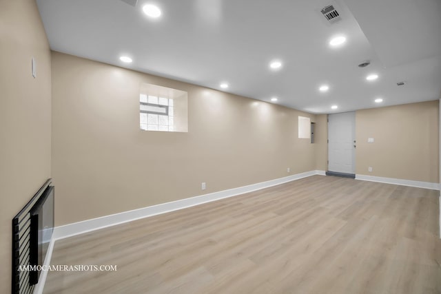 5029 W Superior St, Chicago, IL 60644 - below grade area with light wood-type flooring and recessed lighting