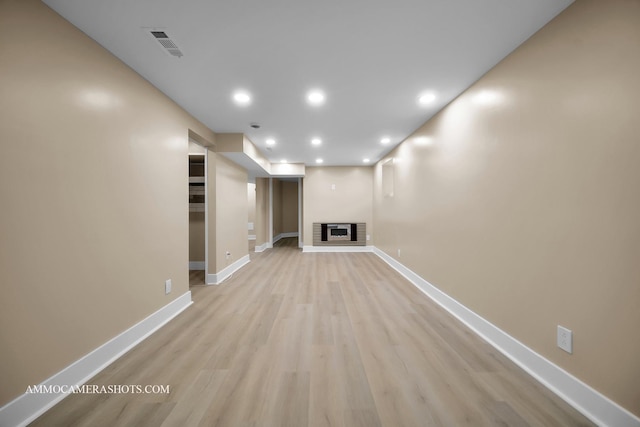 5029 W Superior St, Chicago, IL 60644 - unfurnished living room featuring light wood-style flooring and recessed lighting