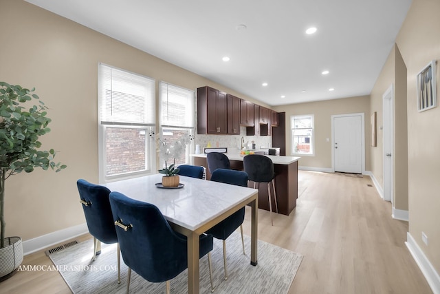 5029 W Superior St, Chicago, IL 60644 - dining area with light wood-style flooring and recessed lighting