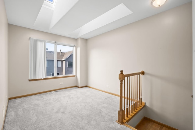 8004 Windsor Dr Unit 8004, Darien, IL 60561 - spare room with a skylight and carpet flooring