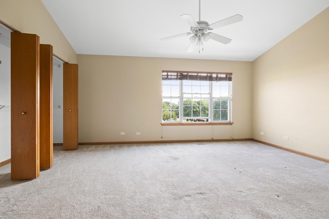 8004 Windsor Dr Unit 8004, Darien, IL 60561 - carpeted spare room with lofted ceiling and a ceiling fan