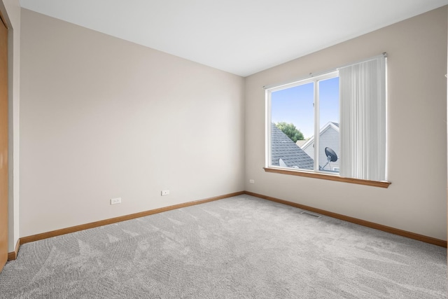 8004 Windsor Dr Unit 8004, Darien, IL 60561 - empty room with baseboards and carpet