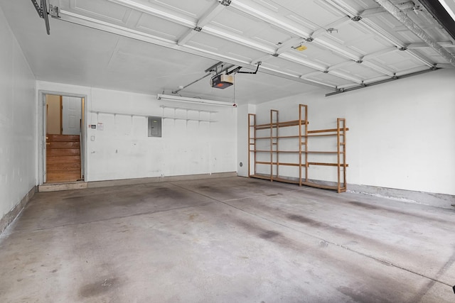 8004 Windsor Dr Unit 8004, Darien, IL 60561 - garage featuring a garage door opener and electric panel