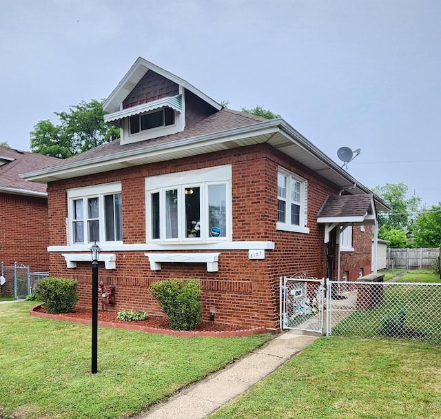 8127 S Blackstone Ave, Chicago, IL 60619 - view of front of property with a gate, brick siding, and a shingled roof