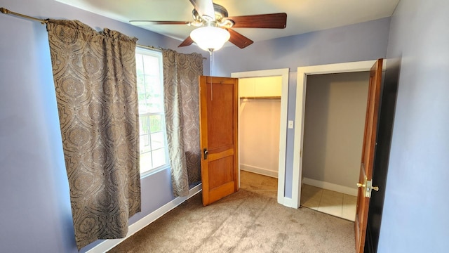 8127 S Blackstone Ave, Chicago, IL 60619 - unfurnished bedroom with light colored carpet and a ceiling fan
