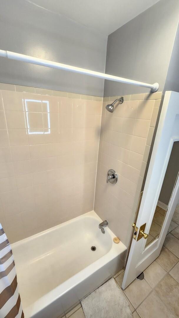 8127 S Blackstone Ave, Chicago, IL 60619 - full bathroom featuring tile patterned floors and shower / tub combination