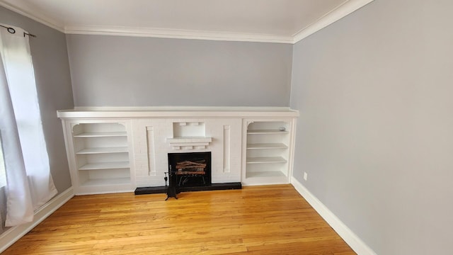 8127 S Blackstone Ave, Chicago, IL 60619 - unfurnished living room with a fireplace, light wood finished floors, and crown molding