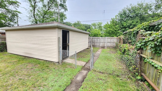 8127 S Blackstone Ave, Chicago, IL 60619 - view of outbuilding featuring a fenced backyard