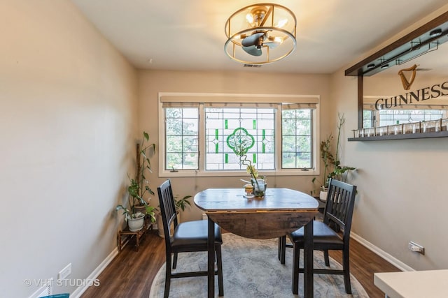 7930 W Lakeview Ct Unit 2A, Palos Heights, IL 60463 - dining area with a chandelier and dark wood finished floors
