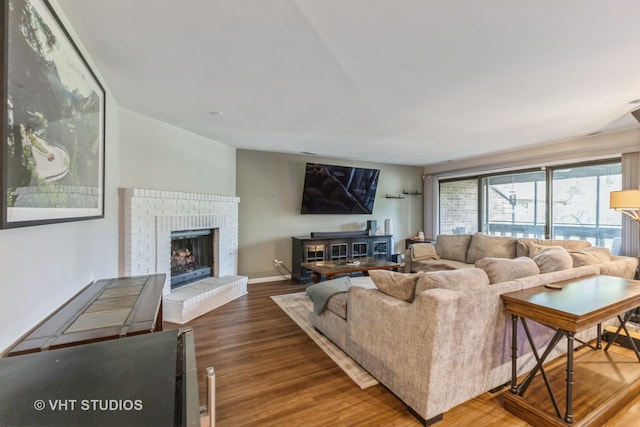 7930 W Lakeview Ct Unit 2A, Palos Heights, IL 60463 - living room featuring wood finished floors and a fireplace