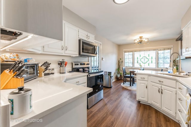 7930 W Lakeview Ct Unit 2A, Palos Heights, IL 60463 - kitchen with stainless steel appliances, white cabinetry, and dark wood-type flooring