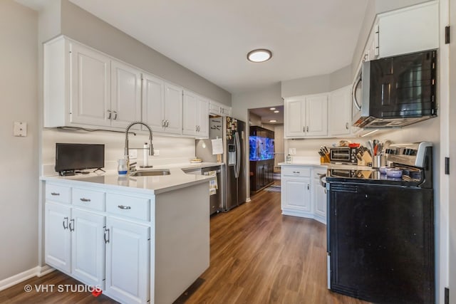 7930 W Lakeview Ct Unit 2A, Palos Heights, IL 60463 - kitchen featuring stainless steel appliances, dark wood finished floors, and white cabinetry