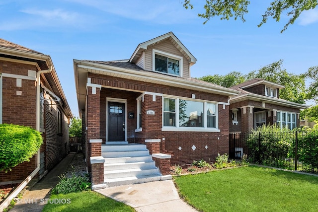 5155 W George St, Chicago, IL 60641 - bungalow-style house featuring brick siding and a front yard