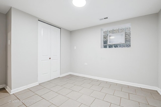 5155 W George St, Chicago, IL 60641 - unfurnished bedroom featuring a closet and baseboards