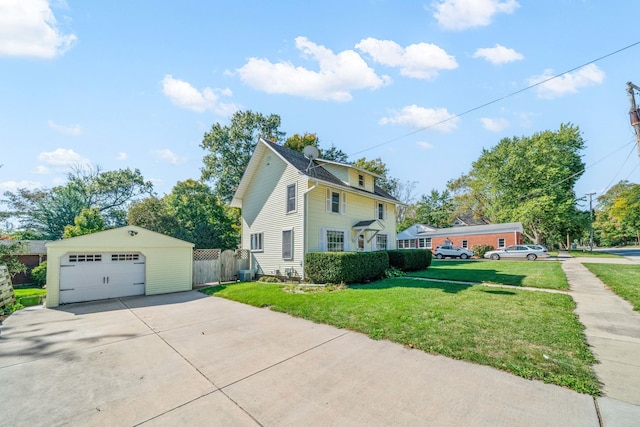 557 E Mckinley St, Hinckley, IL 60520 - view of property exterior featuring a detached garage, an outbuilding, and driveway