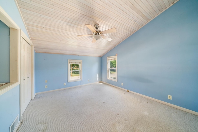 557 E Mckinley St, Hinckley, IL 60520 - spare room featuring lofted ceiling, wood ceiling, carpet, and ceiling fan