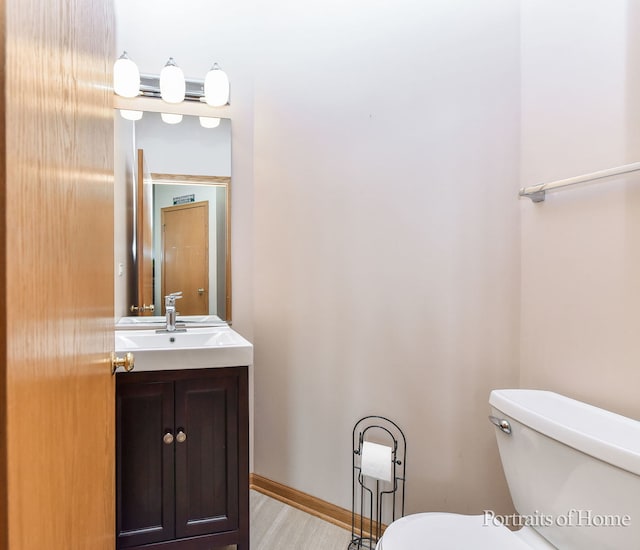 497 Le Moyne Ave, Romeoville, IL 60446 - half bath with vanity and wood finished floors