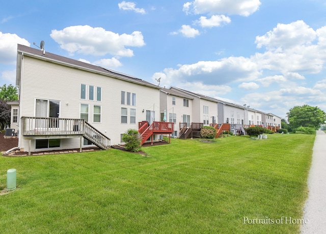 497 Le Moyne Ave, Romeoville, IL 60446 - rear view of property with stairway, a residential view, a yard, and a deck