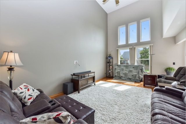 497 Le Moyne Ave, Romeoville, IL 60446 - living area featuring high vaulted ceiling, ceiling fan, and wood finished floors