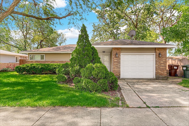 431 Lakewood Blvd, Park Forest, IL 60466 - ranch-style house featuring brick siding, a front yard, an attached garage, and driveway