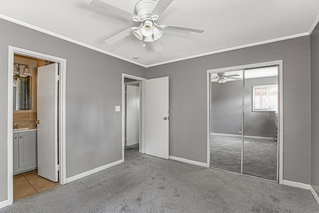 431 Lakewood Blvd, Park Forest, IL 60466 - unfurnished bedroom with crown molding, carpet flooring, a closet, ensuite bath, and a ceiling fan