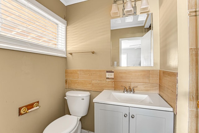 431 Lakewood Blvd, Park Forest, IL 60466 - half bath featuring vanity, plenty of natural light, and tile walls