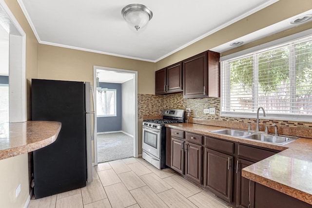 431 Lakewood Blvd, Park Forest, IL 60466 - kitchen featuring stainless steel appliances, dark brown cabinetry, backsplash, and crown molding